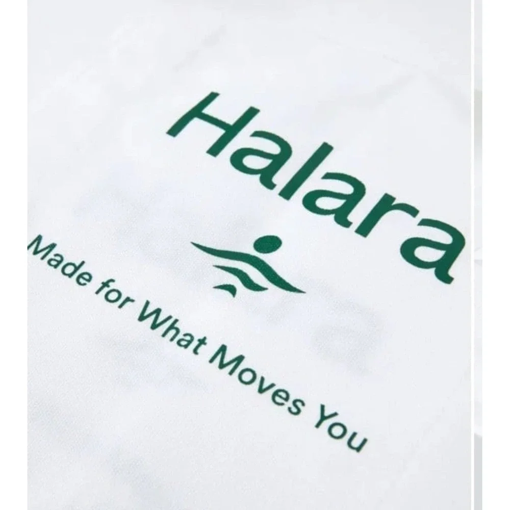 Women's white Halara canvas tote bag with a‎ green logo and text NWT travel gym